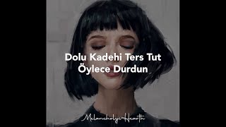 Dolu Kadehi Ters Tut - Öylece Durdun (Sözleri/Lyrics) Resimi
