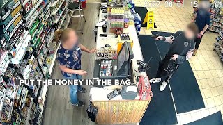 Surveillance video: Boy robs gas station, fires shot Resimi