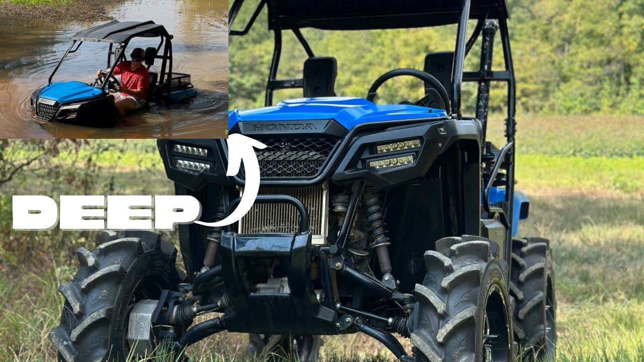Honda pioneer 500 on portals and 33s going through deep pond
