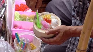 泰国街边的椰子冰淇淋，不但好吃而且漂亮，一个售价才10元 