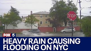 Heavy rain causing flooding on NYC roadways