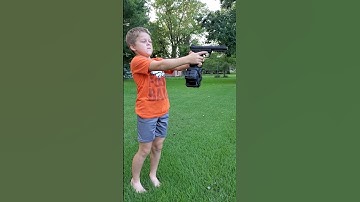 Thumbnail of Kid shooting airsoft gun