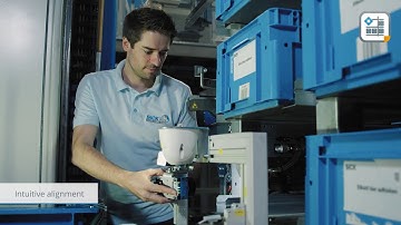 Fine positioning of stacker crane in high bay storage with InspectorP   SICK AG