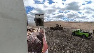 Delivering debris to the landfill South of Onaway.