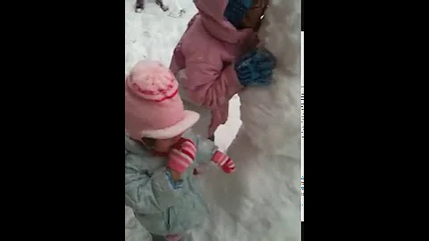 Macie eating our snowman