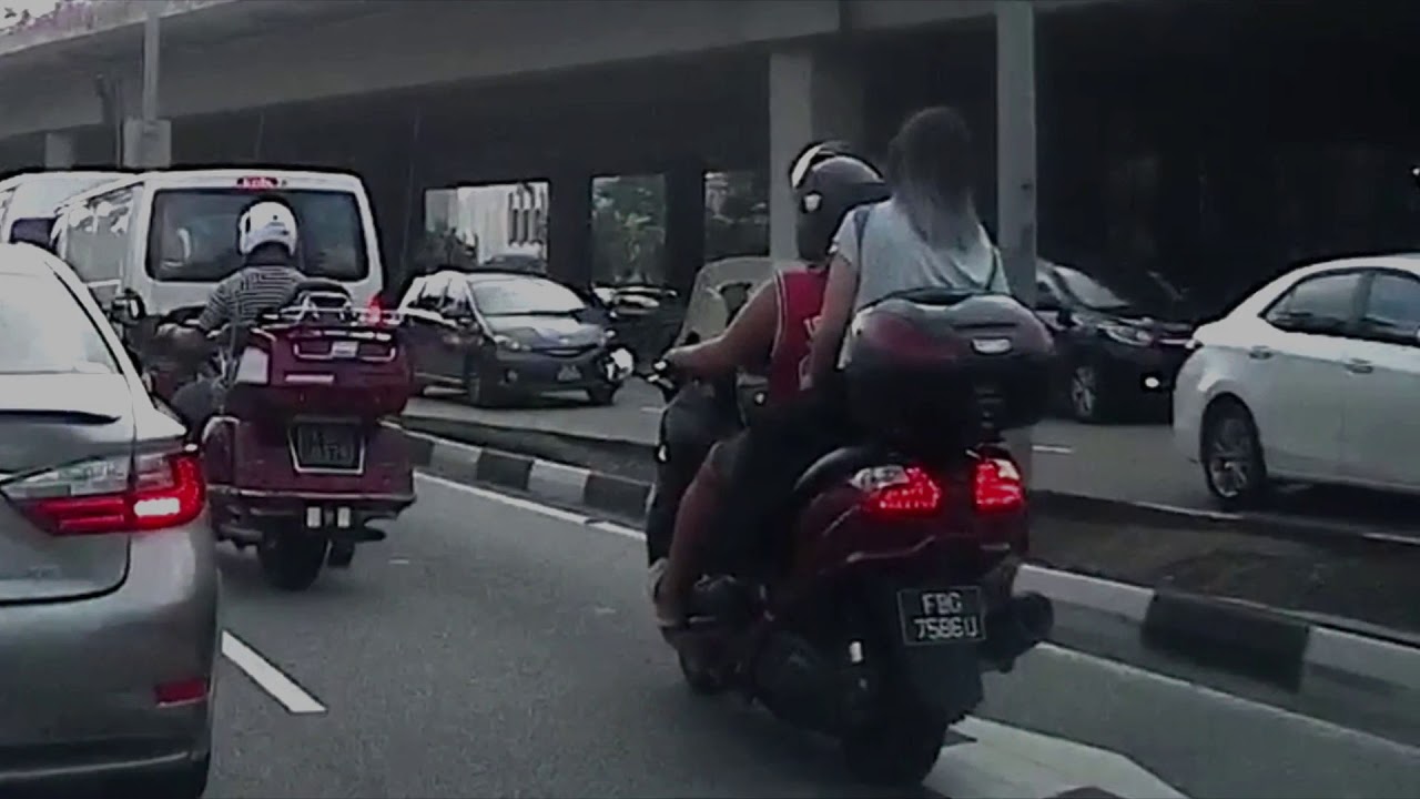 Pillion without helmet