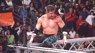 The late Eddie Guerrero executes a Frog Splash onto JBL screenshot 5