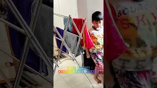 anak bantuin ayahnya jemur pakaian# Kahlil badlin almanfaluthi