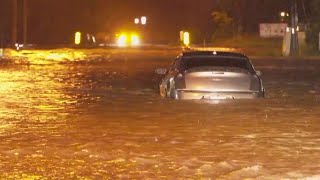 Texas flooding: High waters submerge vehicle in Everman