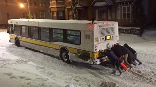 Strangers Come to Rescue of Bus Stuck on Icy Street