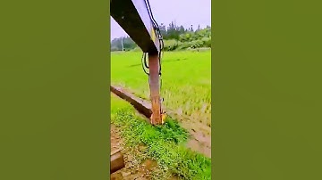 The process of cleaning up weeds in the gutter = good machinery can do more with less