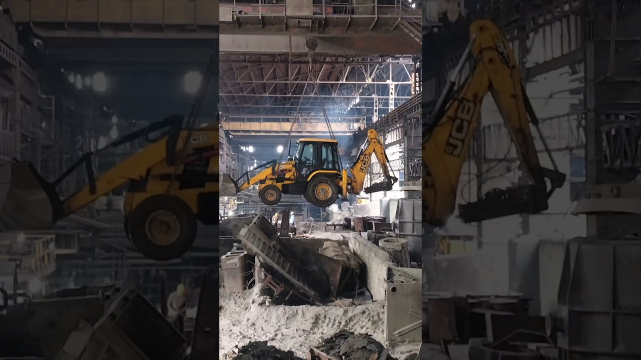 jcb lifting from crane , jcb from crane