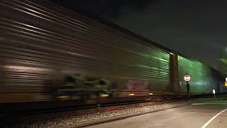 Two Union Pacific locomotives leading a Northbound autorack and intermodal on track one