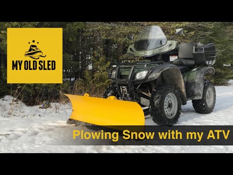 atv-plowing-snow---[honda-rancher-/-50"-moose-plow]