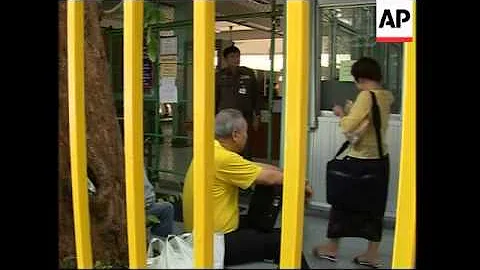 Media outside police building where Karr is held