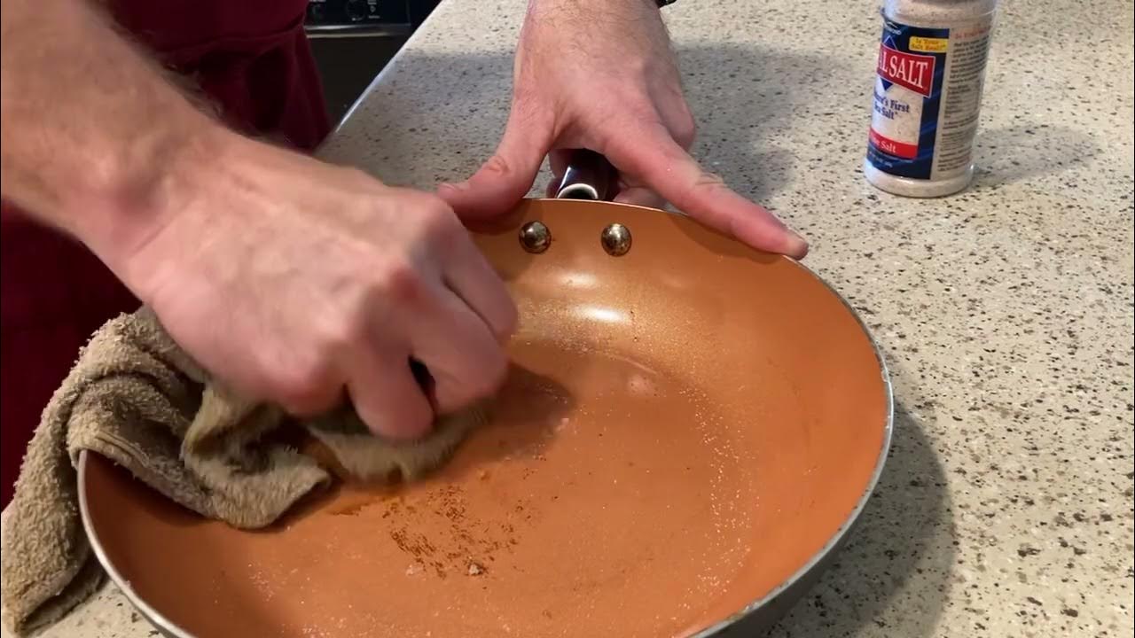 Cleaning burned in oil on a non-stick pan - YouTube