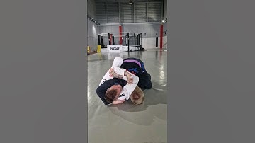 Half-Guard Lapel Attack.