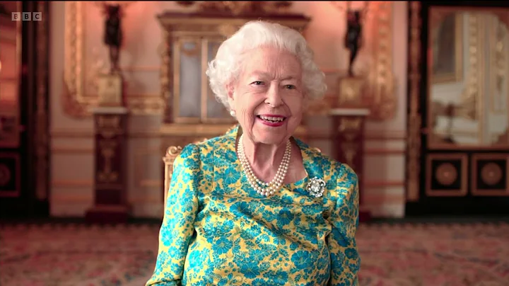 The Queen with Paddington Bear and "We Will Rock Y...