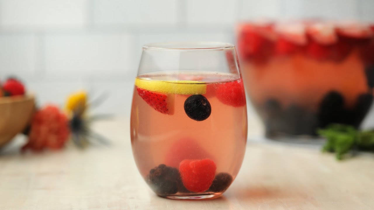 Berry and Rosé Summer Sangria // Presented by Kroger - Sip on the refreshing taste of summer with this incredible berry and rosé sangria. Get all the ingredients at your local Kroger to mix this delicious drink!