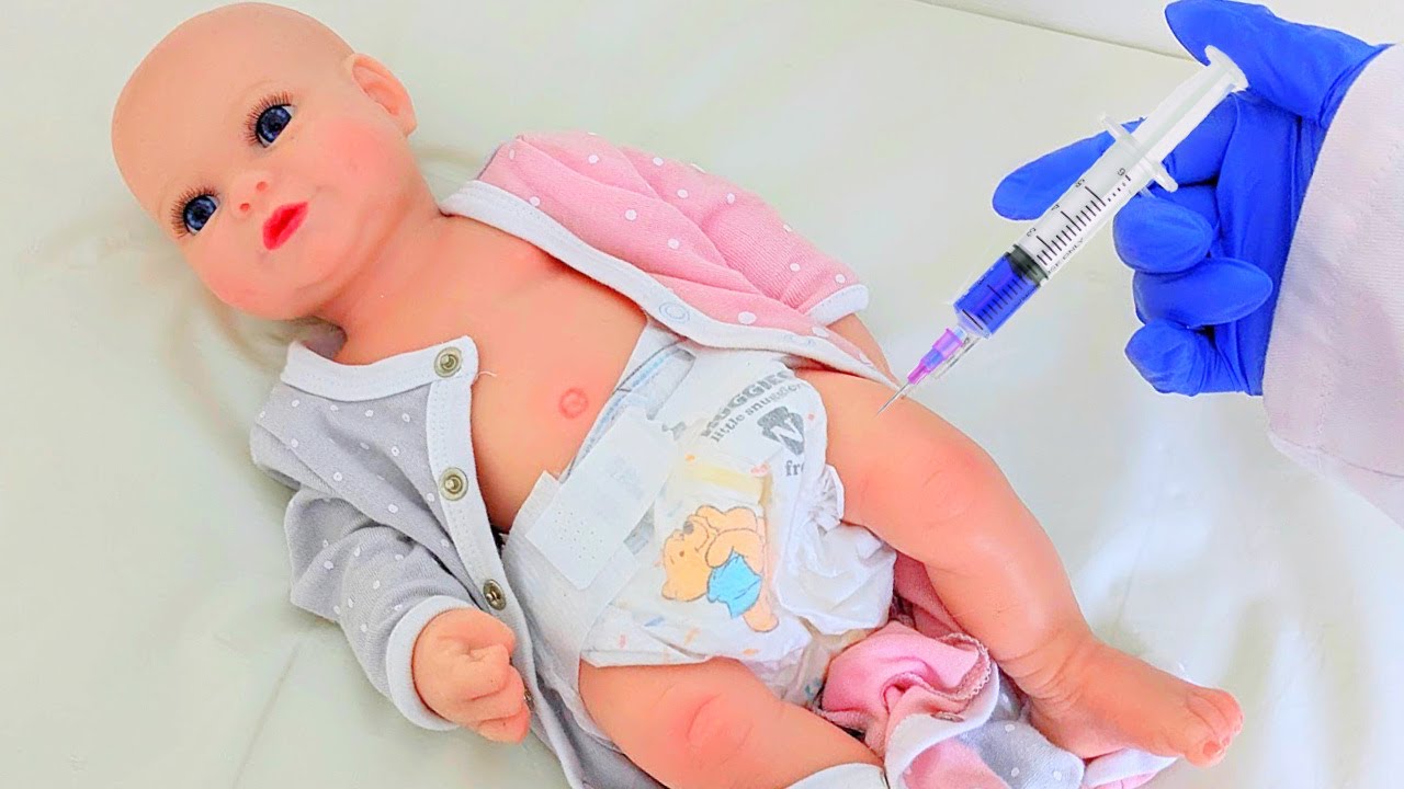 Silicone Baby Gets Vaccination and Wellness Check - YouTube