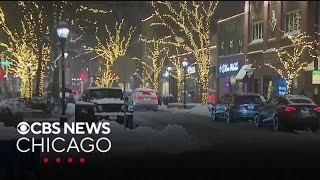 Snow continues to fall in Chicago area, blankets western suburbs