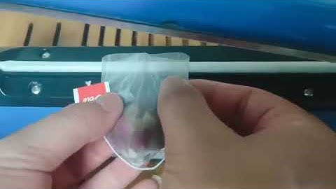 heatsealing  empty nylon tea bag ith string and tag