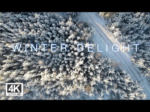 Winter Delight - 4k Relaxing video - Music and stunning winter landscape drone movie.