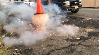 Orange Traffic Cone explodes in slomo
