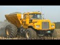 Trucks And Tractors Preparing A Planting Field from Farm Country Ahead