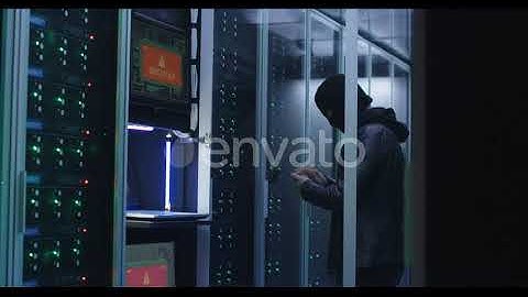 Black Man Hacking Computer System in Server Room | Stock Footage - Envato elements
