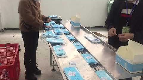 Automatic face mask packing machine