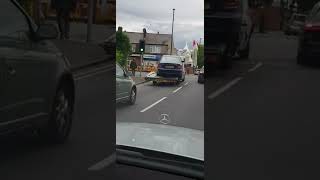 Dangerously Loaded Vehicle Hanging Off Recovery Truck