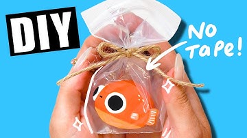 paper squishy WITHOUT TAPE!!!🐟🐡no tape paper squishy tutorial 2025 goldfish in a bag!!
