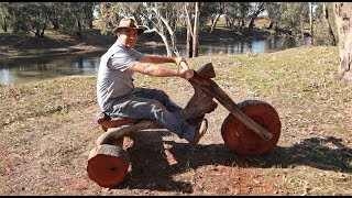 I make a Wooden Motorcycle Trike. Woodworking fun using Logs and a bit of Chainsaw Wood Carving.