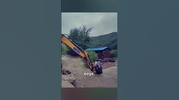 Heroic Excavator Operator Rescues Woman Trapped by Floodwaters