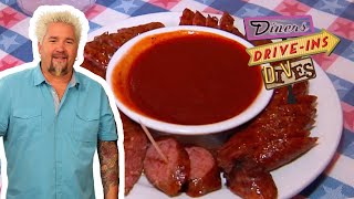 Guy Fieri Sees How the Sausage Is Made at T-Bone Tom's | Diners, Drive-Ins and Dives | Food Network