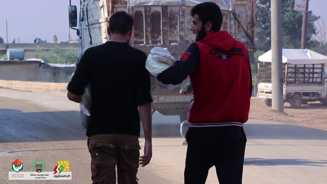 هيئة ساعد الخيرية _ توزيع الخبز في قرية ميزناز