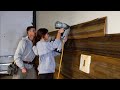 Dad n Daughter Install Ancient Cedar Feature Wall
