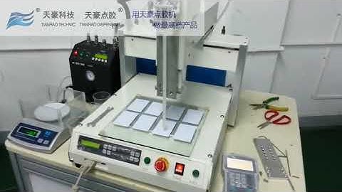 Epoxy resin doming machine TH-206H-2004ab1.      Www.TianHao dispensing.com.