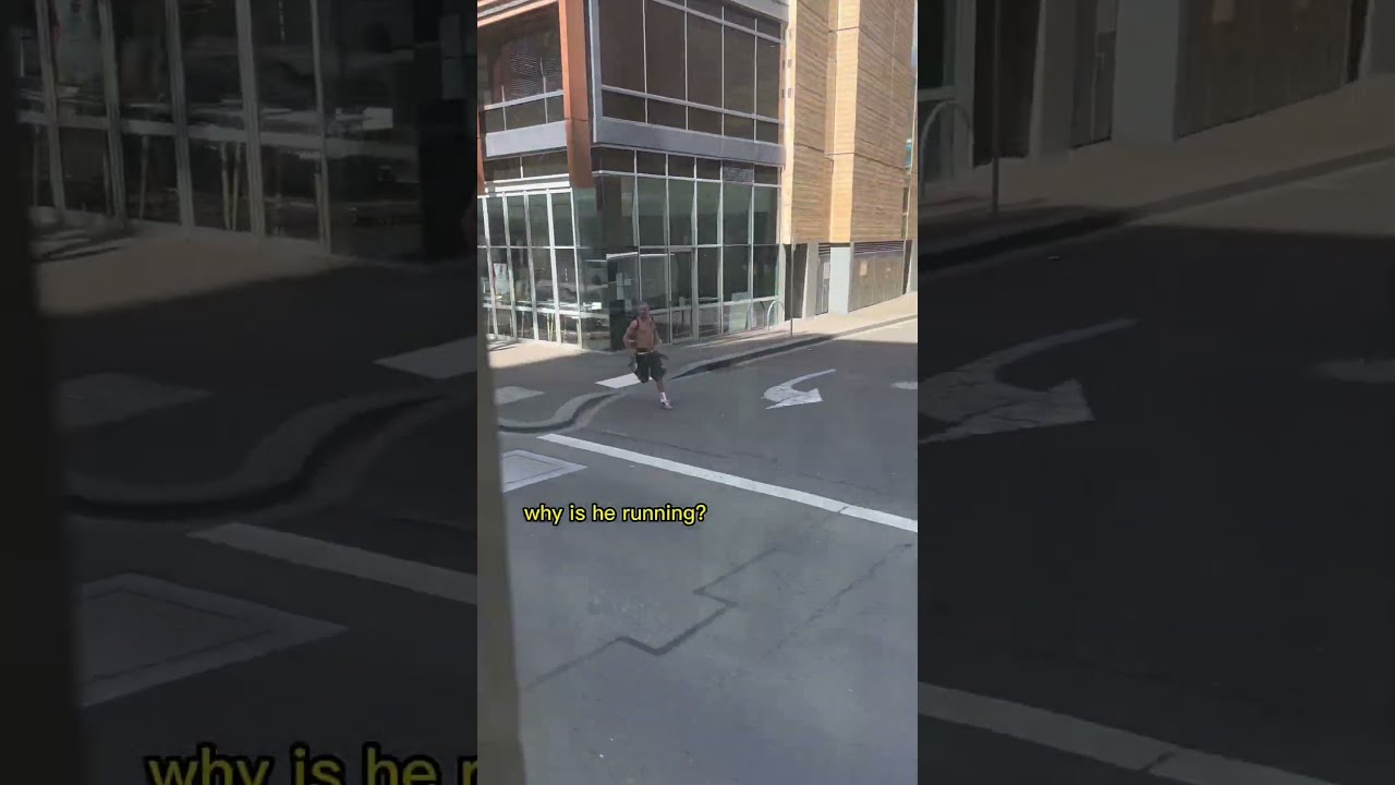 MAN RUNS TO CATCH UP WITH BUS RACE 
