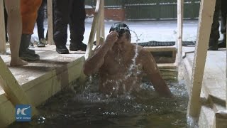 Raw Russians Take Icy Water Bath To Celebrate Orthodox Epiphany