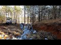 Installing Rip Rap for Drainage Ditch and Erosion Control