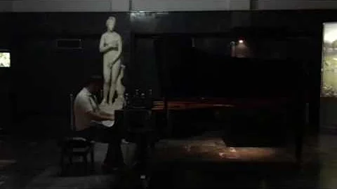 Trying out the piano in the museum in Skopje, Mace...