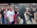 Fight nearly breaks out between shannon briggs  viddal riley  who loses the plot being restrained