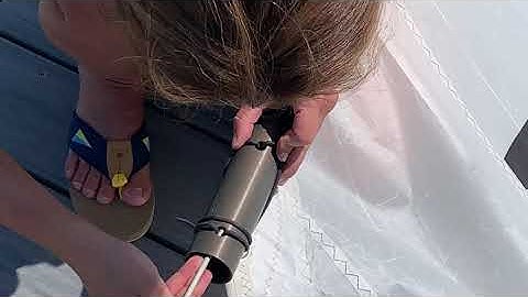 How to slide your opti race sail on and off the mast