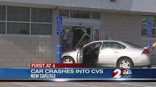Car crashes into CVS