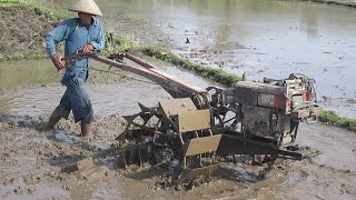 Two Wheel Tractor Yanmar Spreading Mud