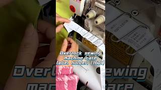 Overlock sewing machine care label holder.