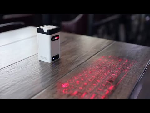 Проекционная Bluetooth  клавиатура с Алиэкспресс.Вы просто офигеете,товары из Китая.