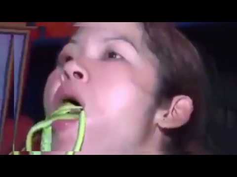 Girl Eating Live Mouse